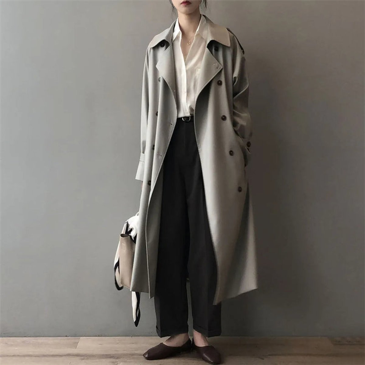 Double-Breasted Long Trench Coat with a Notched Collar and Adjustable Cuffs 0