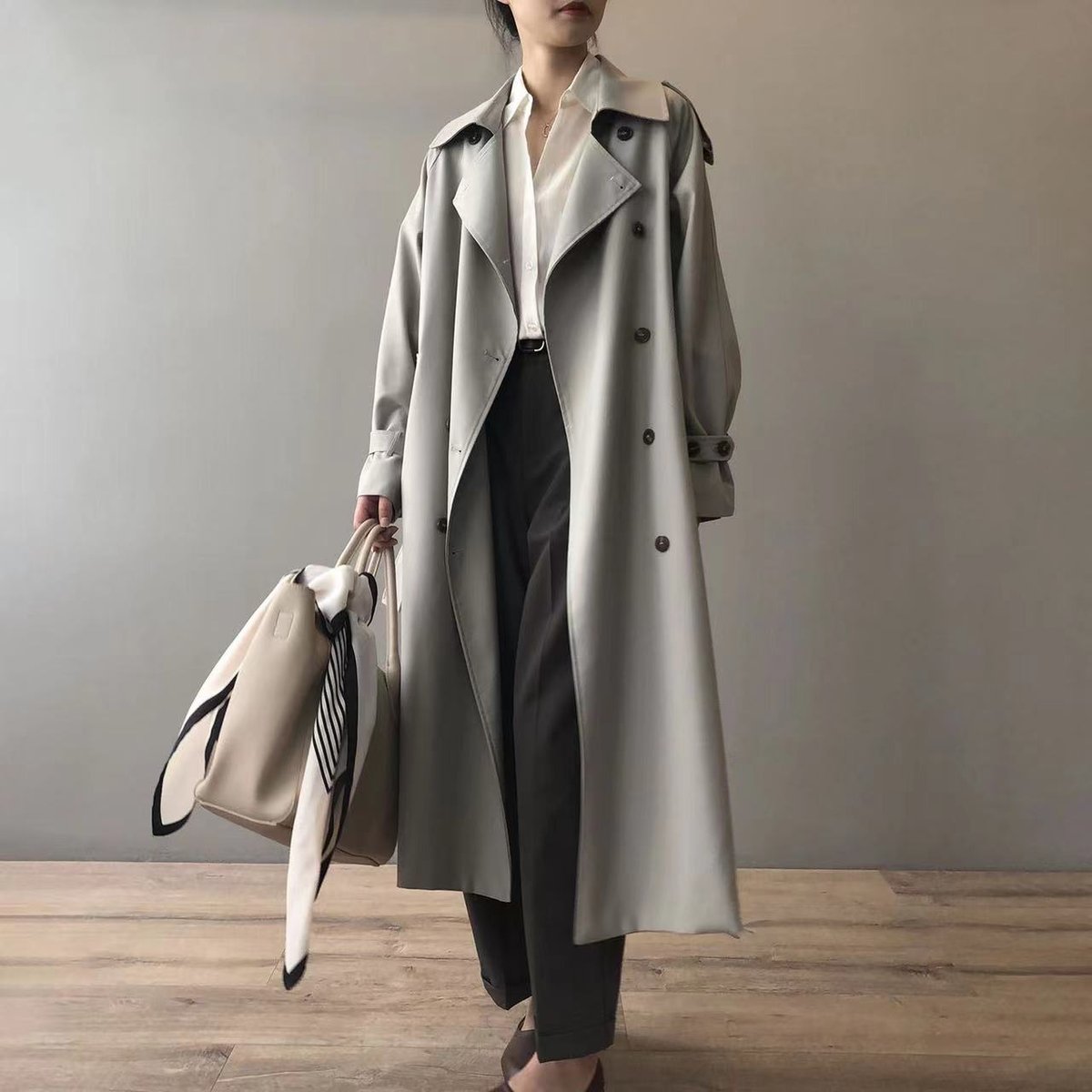 Double-Breasted Long Trench Coat with a Notched Collar and Adjustable Cuffs 1