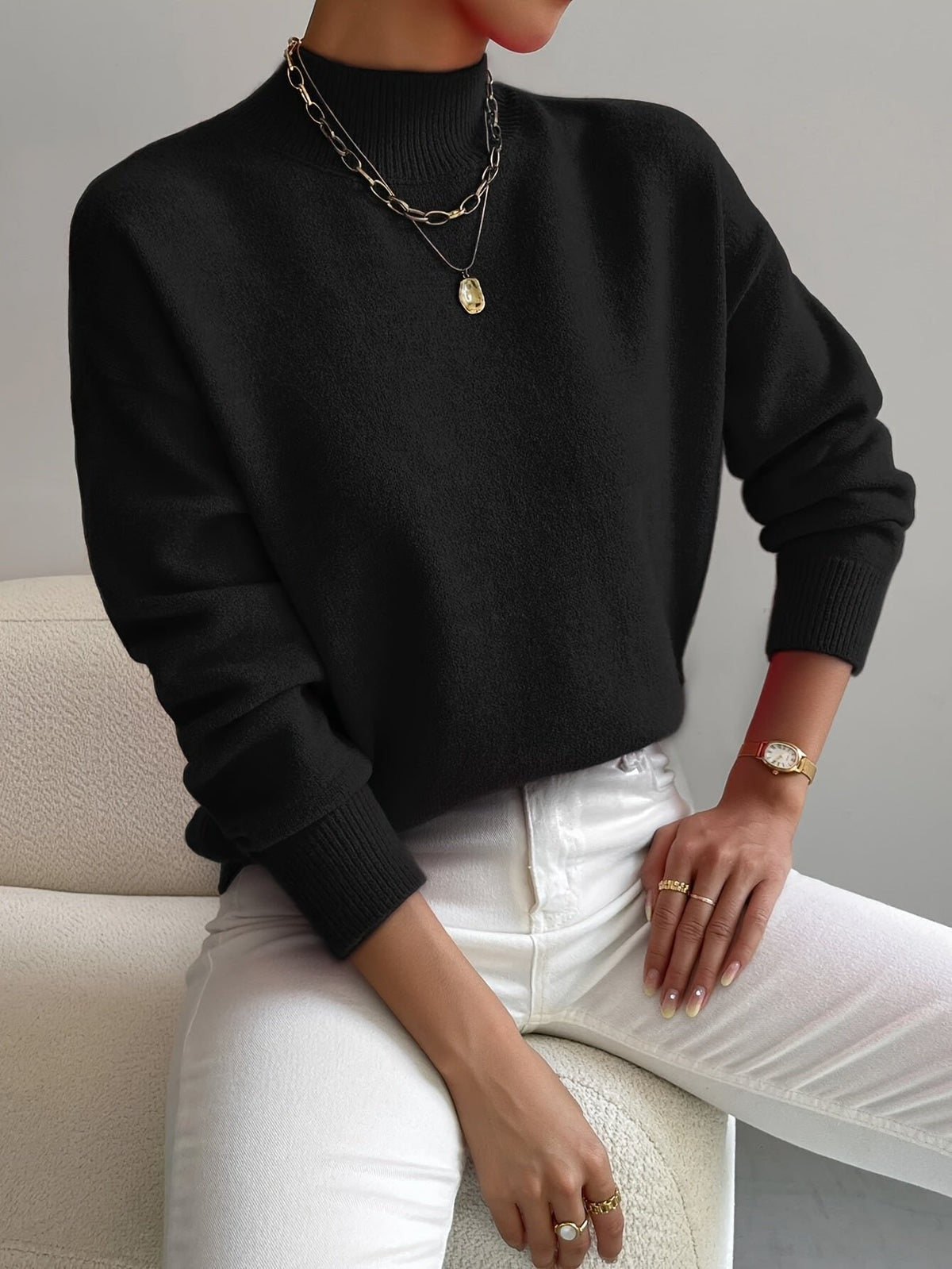 Mock Turtleneck Sweater with a Relaxed Cut and Ribbed Hem in Black