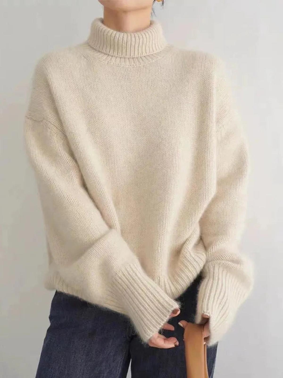 Oversized Knit Sweater with a Turtleneck and Dropped Shoulders in Beige