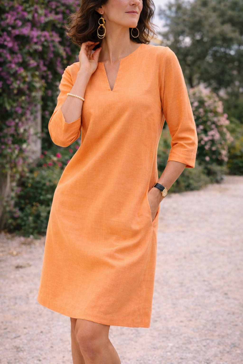 Relaxed Mini Dress with a Split V Neck and Three-Quarter Sleeves in Orange